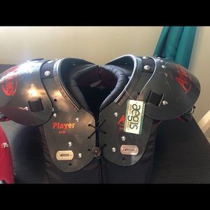 NWT YM football shoulder pads/helmet